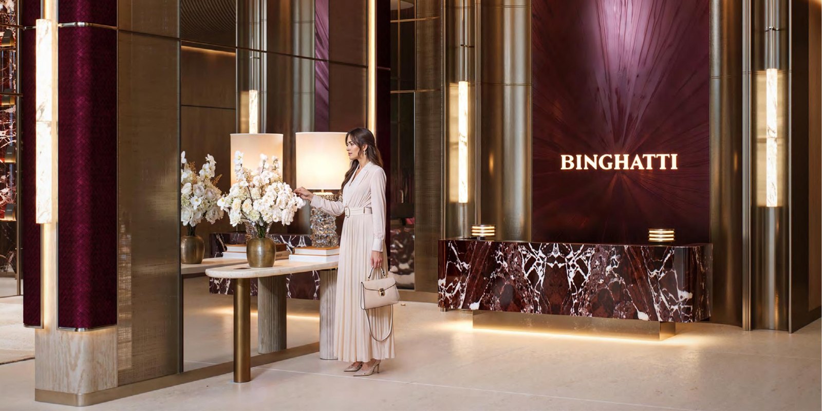 La lobby di Binghatti Spectre in calcare avorio e velluto bordeaux, render ufficiale